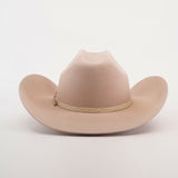 Discover the allure of the 6X Bull Belly, a luxurious tan cowboy hat with a wide brim and braided band around the crown, beautifully presented against a plain white background.