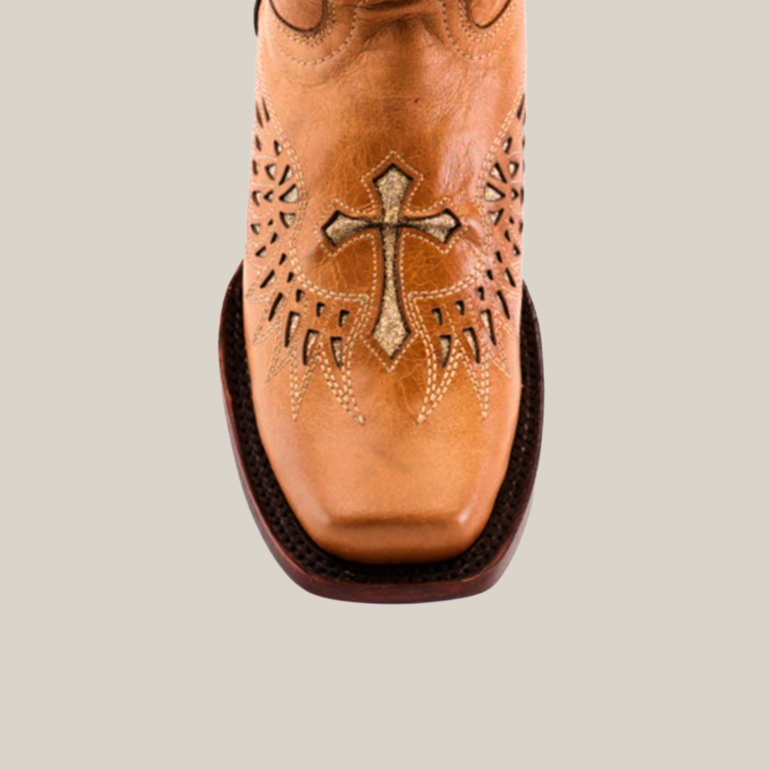 The Texas Cross Glitterbomb Orix boot offers premium leather with detailed toe patterns, a decorative cross, and dark brown trim on a white background. It features a narrow square toe and mid shaft design.