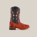 The Exotic Pirarucu Fish Patchwork Cogñac Square Toe cowboy boot features a black shaft with detailed embroidery and textured Pirarucu leather. It has a stacked heel and square toe for a distinctive look.