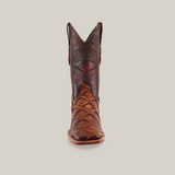 The Big Bass Pirarucu Print Rustic Cogñac cowboy boot is displayed from the front against a plain white background, crafted beautifully from premium cowhide, showcasing intricate stitching and detailed texture with a square toe design.