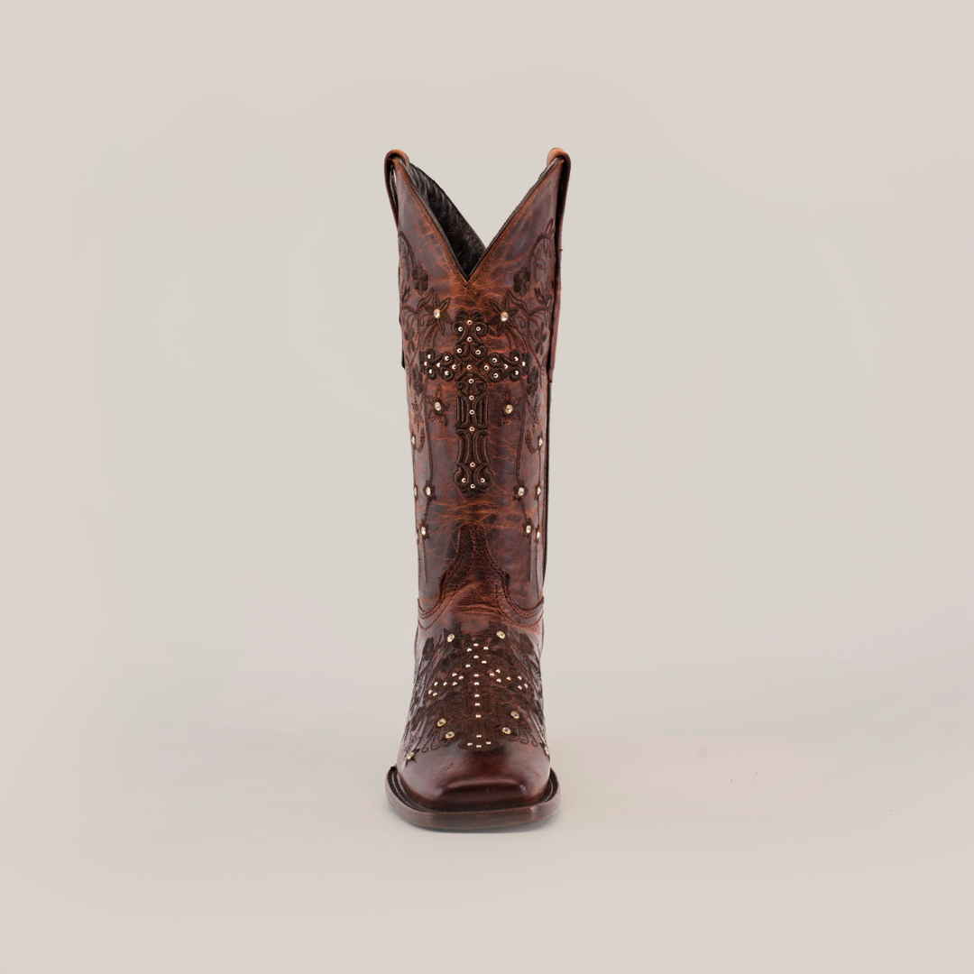 Front view of a Marga Cruz Brick Mid Shaft Square Toe boot, made from premium brown leather with intricate embroidery and metallic studs, set against a plain white background.