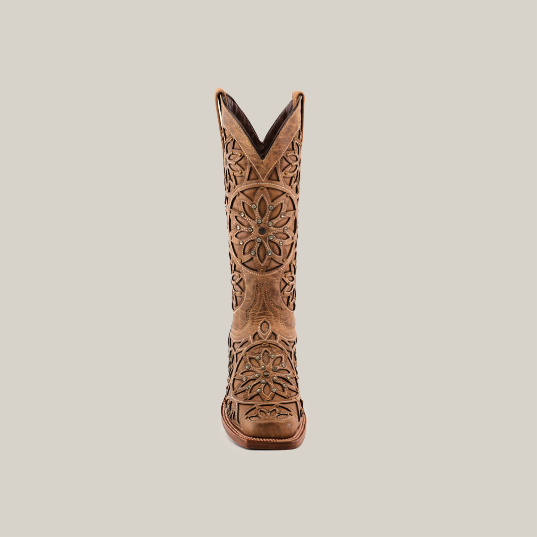 Front view of a handcrafted Vitralli Crystals Fawn boot in brown with floral and geometric embroidery. Standing upright against a white background, its narrow square toe dazzles subtly with crystal embellishments.