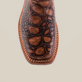 Close-up of a Loggerhead Turtle Print brown Rodeo Toe boot crafted from premium cowhide leather with detailed stitching and textured turtle print on a plain white background.