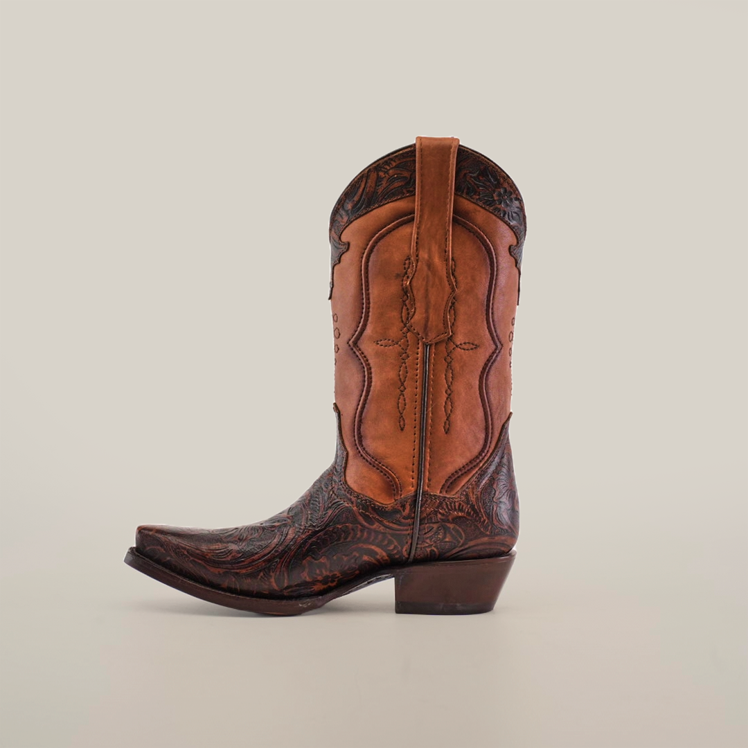 The Handtooled Flowers Brown short shaft boot features a snip toe and intricate patterns on premium leather, showcasing handcrafted elegance. It is presented against a plain white background.