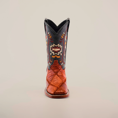 Front view of the Exotic American Alligator Patchwork Cogñac Square Toe boot, featuring a dark upper with colorful embroidery and a textured cognac-colored foot. The design highlights geometric patterns and intricate stitching, reminiscent of patchwork, elegantly centered on a light background.