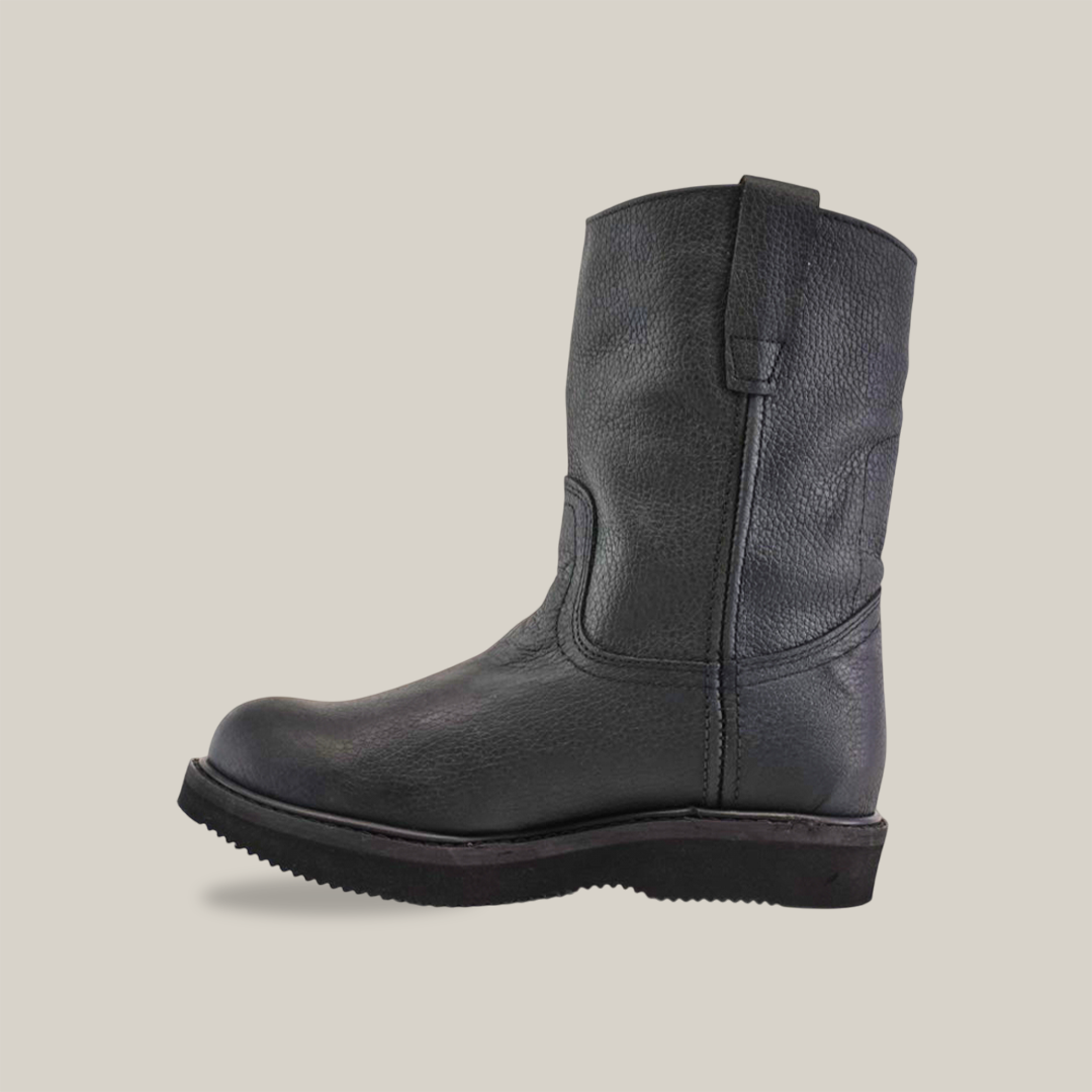 The Black Roper - Laredo Sole - Soft Toe boot, made from premium cowhide black leather, is shown in profile against a plain white background. It features a textured surface, flat sole, and pull tabs near the top for easy wear.