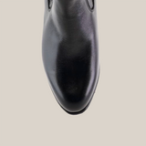 Top view of a Napa Black Square Toe shoe, handcrafted in black leather with a square toe, set against a white background.