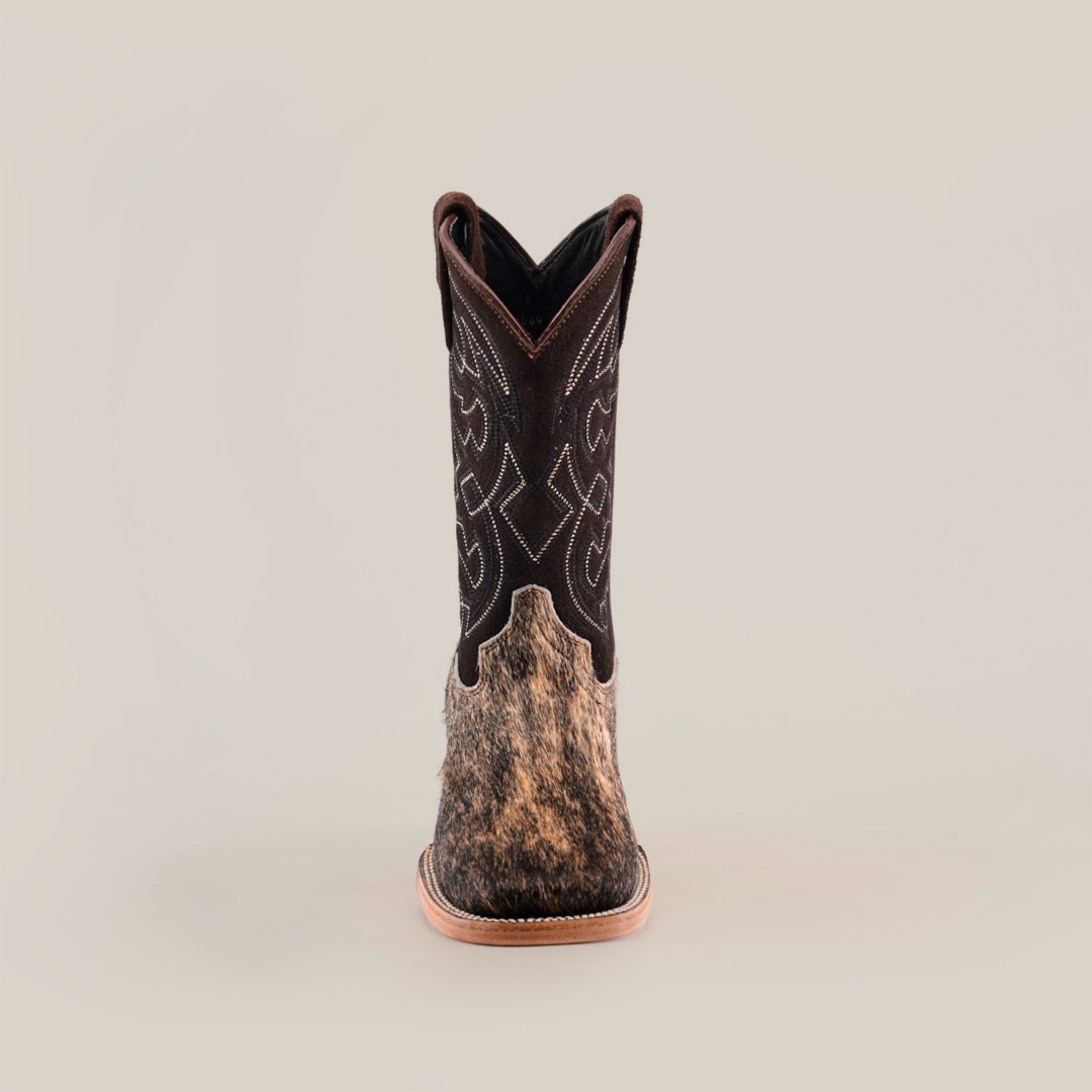 A single Cowhide Hair Fawn Square Toe cowboy boot features a brown leather upper with intricate stitching and a textured cowhide-like lower portion, all on a plain white background.