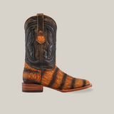 The Gator Print Rustic Honey - Square Toe is a premium cowhide leather boot in brown and black with a textured gator print, featuring a low wooden heel and intricate stitching, showcased against a plain white background.