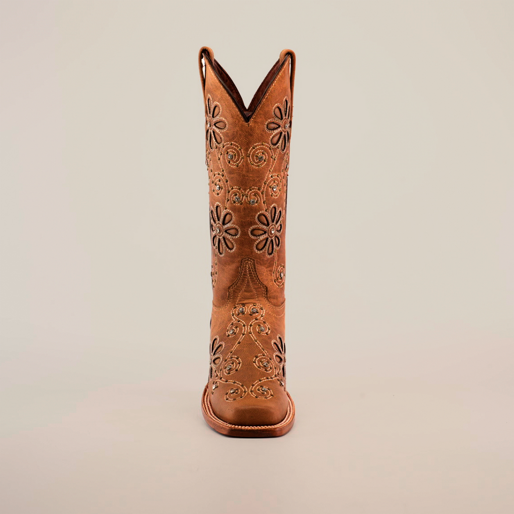 Front view of a single tall brown cowboy boot, Napoles Crystals Flowers Fawn - Mid Shaft - Narrow Square Toe, showcasing handcrafted floral embroidery, set against a plain white background.
