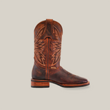 The Azkar Moka cowboy boot features rich cowhide leather, intricate stitching on the shaft and toe, a stacked heel, pull tabs, and a rustic look. Its slip-resistant sole and square toe design provide rugged style and steady footing on any terrain.