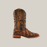 The Big Bass Pirarucu Print Rustic Orix boot showcases an intricate brown cowhide leather upper, a textured Pirarucu print on the lower part, a square toe, wooden sole, and pull strap, all displayed on a plain white background.