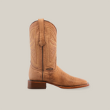 The Sierra Fawn - Square Toe cowboy boot features intricate shaft stitching, a stacked wooden heel, and a pointed toe. Handcrafted from premium cowhide leather, it is angled right with pull tabs at the top against a plain white background.