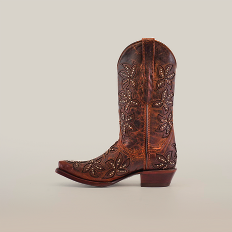 The Cosala Moka - Mid Shaft - Snip Toe is a brown womens cowboy boot with premium leather and intricate floral embroidery on the shaft and foot against a white background, featuring a handcrafted design with a low stacked heel and slightly pointed toe.