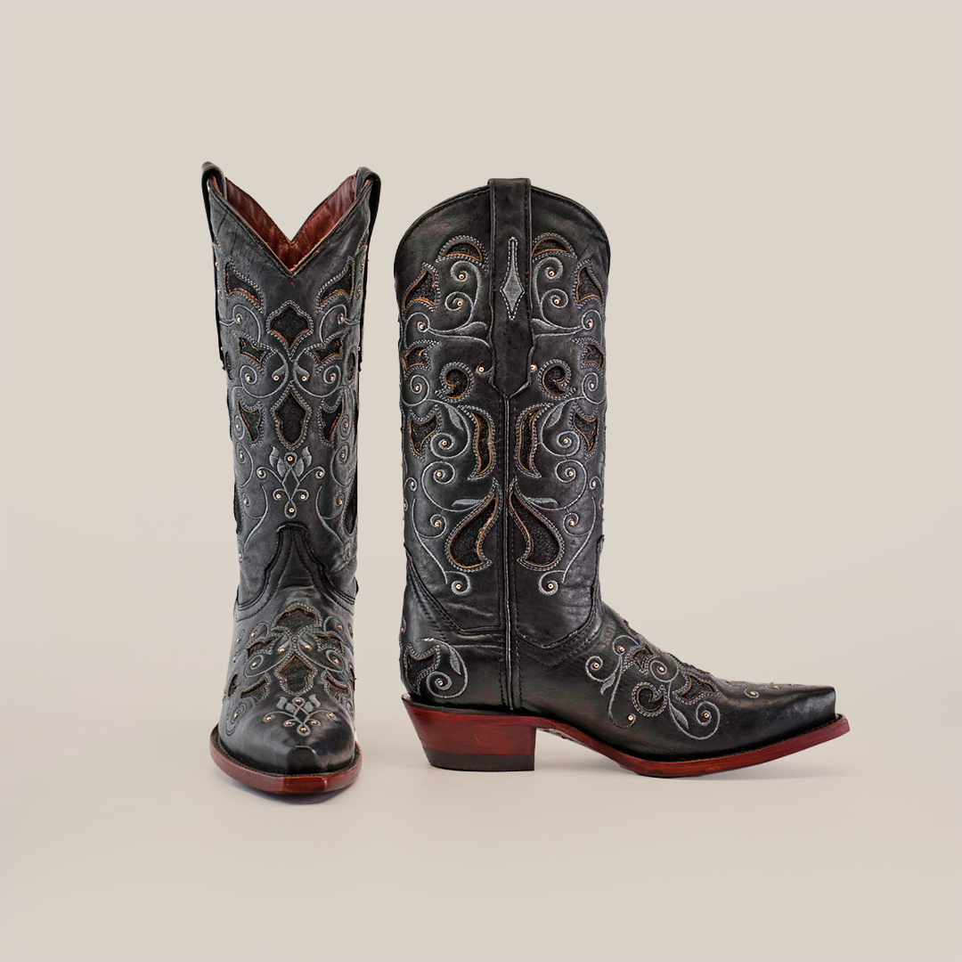 The Nataly Black - Mid Shaft - Snip Toe boots feature ornate silver embroidery on premium leather, showcased against a white background to highlight their elegance and craftsmanship.