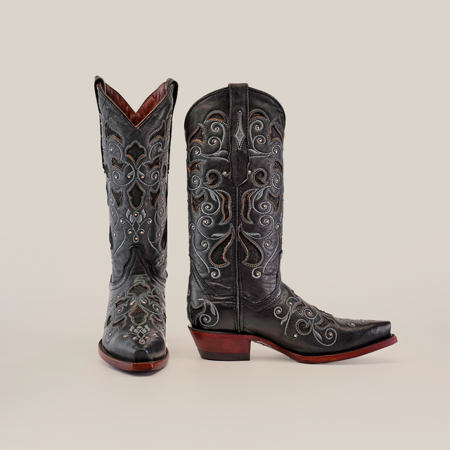 The Nataly Black - Mid Shaft - Snip Toe boots feature ornate silver embroidery on premium leather, showcased against a white background to highlight their elegance and craftsmanship.