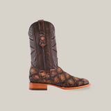 The Big Bass Pirarucu Print Rustic Brown - Square Toe cowboy boot is leather with a pirarucu pattern, resembling alligator skin. It features a smooth wooden heel, square toe design, and a top pull strap, set against a plain white background.