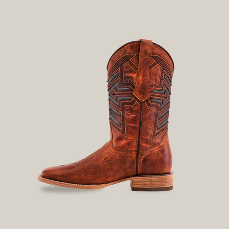 A single Rustic Cogñac - Square Toe boot, handcrafted from premium brown cowhide leather with decorative stitching and a wooden heel, is displayed on a plain white background. Featuring a classic Western design, the boot has pull straps and exudes rustic cognac charm.