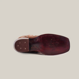 The Croella Orix Crystals shoe is showcased from the sole, highlighting intricate stitching and a textured heel. Its premium burgundy sole features embossed details, all against a plain white background.