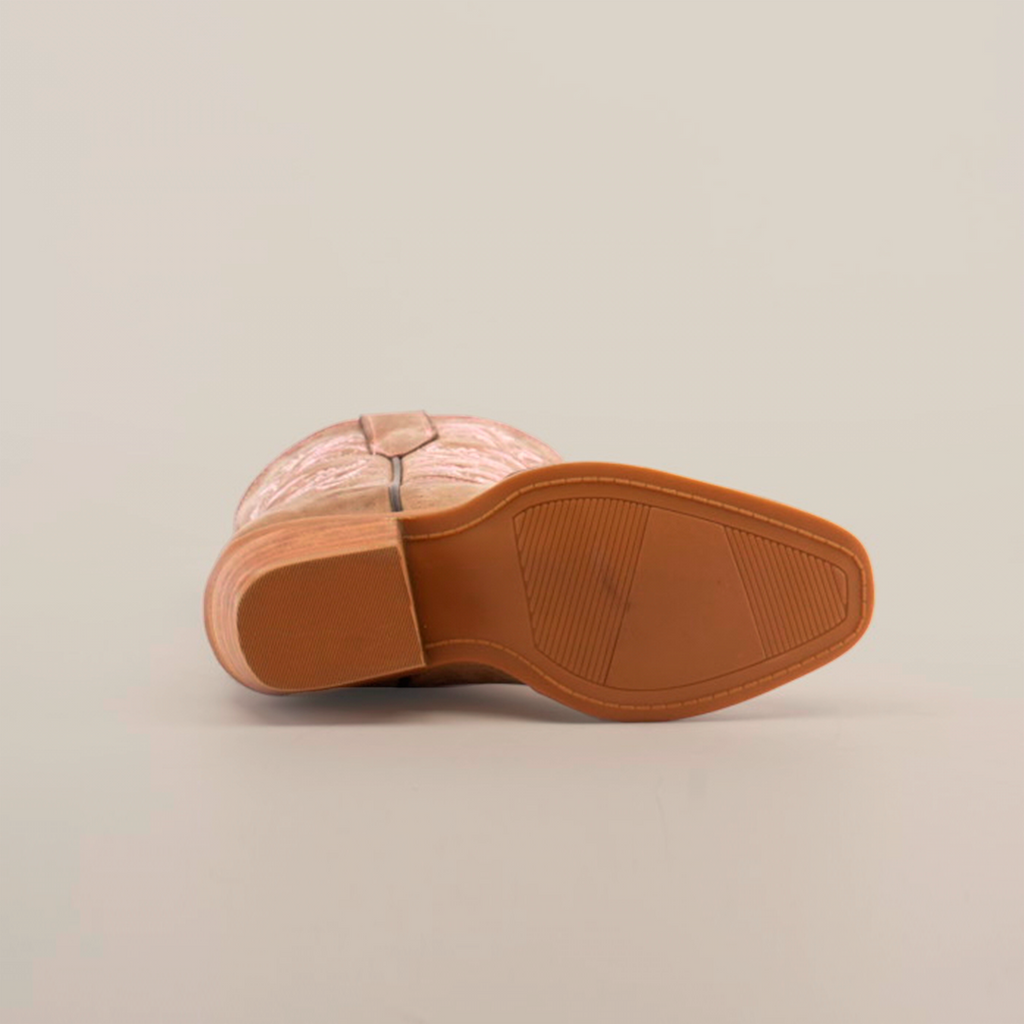 The image features a single Bellere Fawn Snip Toe boot, laid on its side, showcasing its brown premium cowhide leather sole and heel on a plain white background.