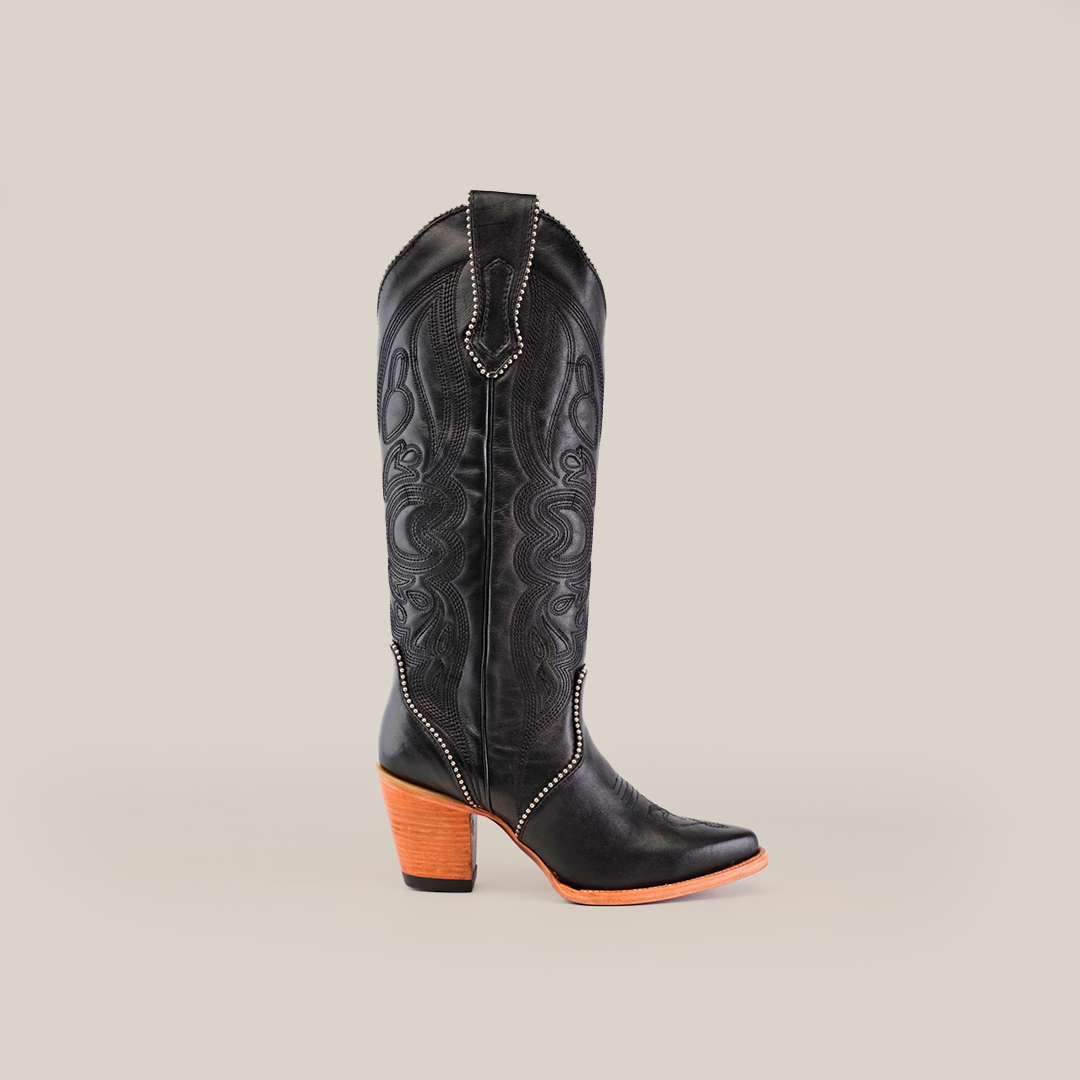 Introducing the Linda Studs Tall Shaft Black - J Toe boot from the Platinum Collection, a luxury handcrafted masterpiece featuring exquisite decorative stitching and stud detailing against a plain white background.